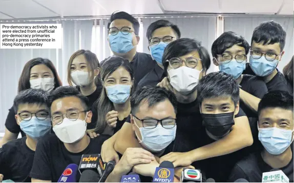  ??  ?? Pro-democracy activists who were elected from unofficial pro-democracy primaries attend a press conference in Hong Kong yesterday