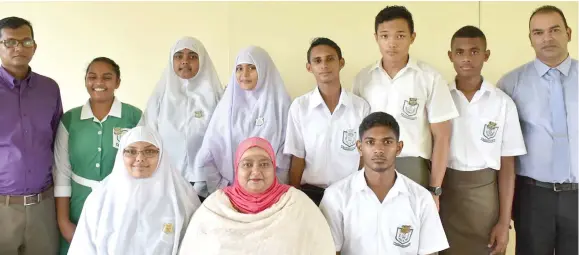  ?? Photo: Nadi Muslim College ?? Back (from left), Assistant Principal Mukesh Kumar, assistant headgirl Amisha Kumar, assistant headgirl Suhaymah Shasiq, deputy headgirl Shaniyah Nisha, deputy headboy Afroz Khan, assistant headboy Jeong Inje Martin, assistant headboy Kelemedi...