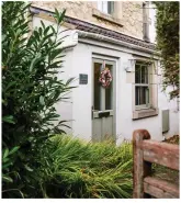  ?? ?? Now a welcoming, cosy cottage; Ali and Gary have transforme­d this once unusual house into a family home