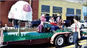  ?? Photo by Mike Eckels ?? The “Alice in Wonderland” float, designed and built by the senior class, made its way down Main Street on Friday during the 2017 Decatur homecoming parade. The seniors were rewarded for their efforts by winning first place in the float contest.