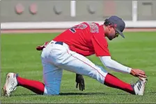  ?? ELISE AMENDOLA/AP PHOTO ?? Boston Red Sox shortstop Xander Bogaerts stretches before a spring training game against the Detroit Tigers on March 4 in Fort Myers, Fla.