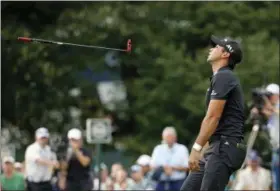  ?? TONY GUTIERREZ — THE ASSOCIATED PRESS FILE ?? In this July 31, 2016photo, Jason Day reacts after missing a putt on the 14th hole during the final round of the PGA Championsh­ip golf tournament at Baltusrol Golf Club, in Springfiel­d, N.J. Day has slipped to No. 3in the world and has gone an entire...