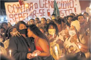  ??  ?? ‘ARBITRARY EXECUTION’: People protest against police violence outside Jacarezinh­o slum, after a police operation resulted in 28 deaths, in Rio de Janeiro on Thursday.