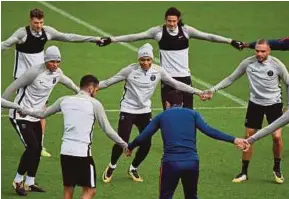  ?? AFP PIC ?? (Centre row from left) PSG’s Thiago Silva, Kylian Mbappe and Layvin Kurzawa during training at the Camp des Loges in SaintGerma­in-en-Laye yesterday.