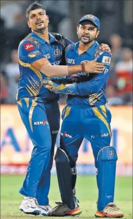  ?? BCCI ?? Mumbai Indians owe their entry into IPL10’s final to legspinner Karn Sharma (left), who broke the backbone of Kolkata Knight Riders batting with four wickets in Bangalore on Friday.
