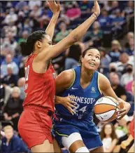  ?? Elizabeth Flores / TNS ?? Minnesota Lynx forward Napheesa Collier, right, and Atlanta Dream forward Naz Hillmon battle under the net during Sunday’s game. Collier played 21 minutes in her first game after giving birth to her daughter, Mila.