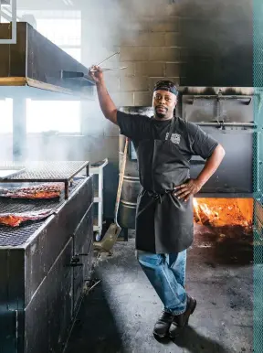  ??  ?? Fire in the Belly James Beard winner Rodney Scott smokes ribs in the pit room of his namesake BBQ restaurant in Charleston.