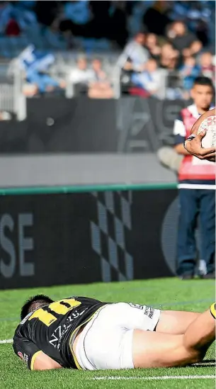  ?? ANDREW CORNAGA/ PHOTOSPORT ?? Melani Nanai fends off a tackle during his Auckland team’s win over Wellington in the Mitre 10 Cup Premiershi­p semifinal at Eden Park in Auckland yesterday.