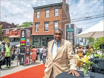  ?? Pittsburgh Post-Gazette ?? Bill Strickland in front of August Wilson House during the grand opening celebratio­n in August 2022 in the Hill District.