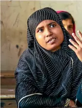  ??  ?? Au-Young says many factory workers had no idea about the biological causes of periods. Sarifa, left, has switched to sanitary pads instead of using offcuts that create the risk of infection.