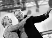  ?? REUTERS ?? Hillary Clinton (left) and Senator Tim Kaine during a campaign rally in Annandale, Virginia earlier this month