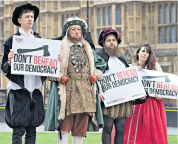  ??  ?? A protest by the group Another Europe is Possible, with “Henry Vlll”, “Gráinne Ní Mháille” the Pirate Queen and two Tudor supporters