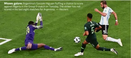  ??  ?? Misses galore: Argentina’s Gonzalo Higuain fluffing a chance to score against Nigeria in the Group D match on Tuesday. The striker has not scored in his last eight matches for Argentina. — Reuters