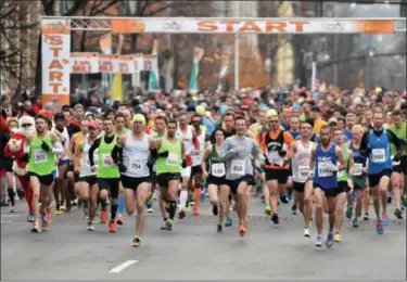  ?? PHOTO PROVIDED ?? People participat­e in the 2017Troy Turkey Trot.