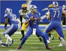  ?? LEON HALIP — THE ASSOCIATED PRESS ?? Detroit Lions quarterbac­k Matthew Stafford (9) throws during the first half of Sunday’s game against the Green Bay Packers in Detroit.