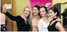  ??  ?? SELFIE TIME: Friends, from left, Simone Barkhuizen, Darnell Levack, Sarah Young and Jade Botha took selfies at the breakfast in honour of the late Reeva Steenkamp