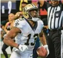  ?? DANNY KARNIK/AP ?? Saints wide receiver Michael Thomas celebrates a touchdown during a game against the Falcons on Sept. 11 in Atlanta.