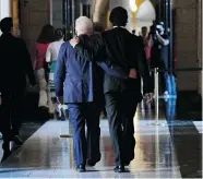  ?? SEAN KILPATRICK/The Canadian Press ?? Liberal Leader Justin Trudeau, right, walks with Bob Rae following a press conference on Parliament Hill in 2013 at
which Rae announced his resignatio­n from the House.