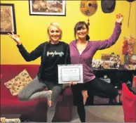  ??  ?? Elaine, right, with her lead yoga tutor, Dr Antonia Califono, after receiving her certificat­ion.