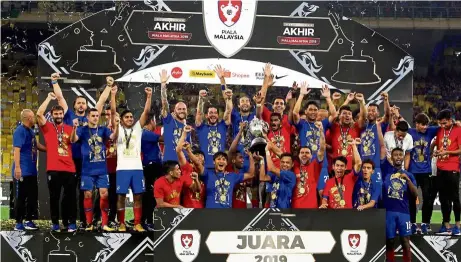  ??  ?? Battle is on again: JDT players celebrate after beating Kedah in the 2019 Malaysia Cup final. Kedah will get the chance for revenge when they meet JDT in the Charity Shield on Feb 26, the curtain raiser to the 2021 season.