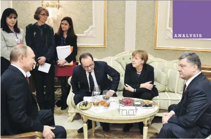  ??  MYKOLA LAZARENKO/AFP/GETTY IMAGES ?? From left, Russian President Vladimir Putin, French President François Hollande, German Chancellor Angela Merkel and Ukrainian President Petro Poroshenko attend a meeting Thursday aimed at halting a 10-month war in Ukraine.