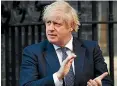  ?? GETTY IMAGES ?? Prime Minister Boris Johnson applauds key workers outside 10 Downing Street on Thursday in London.