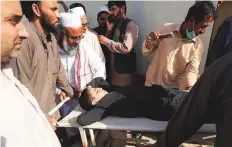  ?? Reuters ?? Thousands of children have been brought to hospitals in Peshawar, in what officials described as mass hysteria.