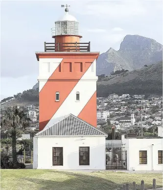  ?? | LEON LESTRADE/African News Agency (ANA) ?? Green Point Lighthouse is an eye-catching landmark in Mouille Point with its bold red and white candy stripes. Dating back to 1824, it was the first solidly constructe­d lighthouse built on South Africa’s coastline. The original lanterns were equipped with single wick Argand lamps fuelled by spermwhale oil. The weak rays could not be seen further than 6 sea miles.