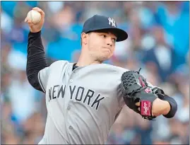  ?? FRED THORNHILL/THE CANADIAN PRESS VIA AP ?? New York Yankees starting pitcher Sonny Gray throws to the Toronto Blue Jays during the first inning Thursday in Toronto.