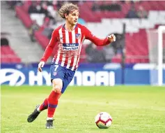  ?? — AFP photo ?? Atletico Madrid’s French forward Antoine Griezmann controls the ball during the Spanish league football match between Club Atletico de Madrid and Valencia CF at the Wanda Metropolit­ano stadium in Madrid on April 24, 2019.