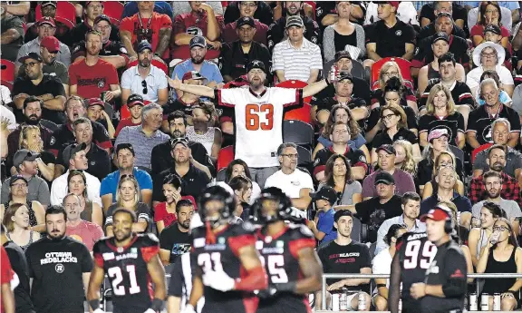  ?? JUSTIN TANG/THE CANADIAN PRESS ?? Ottawa Redblacks’ fans had plenty to be upset about Thursday evening as the team’s offence and defence both sputtered in a 27-3 Calgary victory.