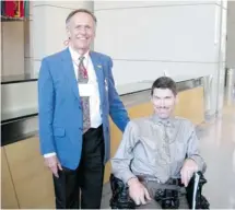  ??  ?? Larry Ladell, left, and Stephen St. Denis at the World Bank in Washington, D.C., earlier this summer.