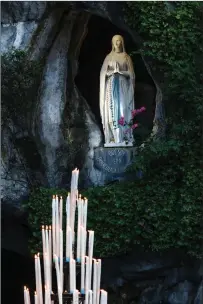  ?? Fr. Lawrence Lew, O.P. ?? This statue of the Immaculate Virgin stands in the Grotto at Lourdes where she appeared to St Bernadette in 1858.