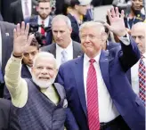  ?? AP ?? Indian Prime Minister Narendra Modi and US President Donald Trump wave to participan­ts at rally in Houston’s NRG stadium on Sunday.