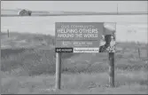  ?? ?? A large display sign next to the site of the Lone Tree community project north of Swift Current.