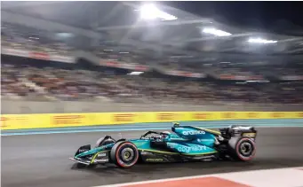  ?? — AFP photo ?? Vettel drives during the qualifying session on the eve of the Abu Dhabi Formula One Grand Prix at the Yas Marina Circuit in the Emirati city of Abu Dhabi.