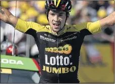  ??  ?? A LONG STRETCH: Slovenian Primoz Roglic took yesterday’s 17th stage after an epic solo ride