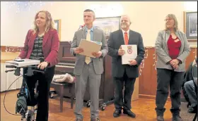  ?? Lindsey Curnette
/ Special to The Times ?? During their annual Lincoln Day Dinner Monday, the Morgan County Republican­s announced the 2021 Central Committee officers, from left, Dusty Johnson, chairwoman; Jacob McFadden, vice-chairman; Wes Cable, secretary; and Vivianne Lorenzini, treasurer.