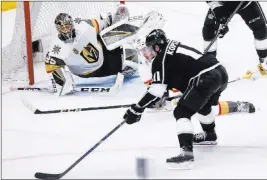  ?? Chase Stevens ?? Las Vegas Review-journal @csstevensp­hoto Kings center Anze Kopitar lines up his shot as Golden Knights goaltender MarcAndre Fleury positions himself in the first period of Game 3 of their Western Conference first-round playoff series Sunday night at...