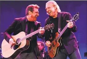  ??  ?? Glenn Frey, left, and Joe Walsh of the Eagles