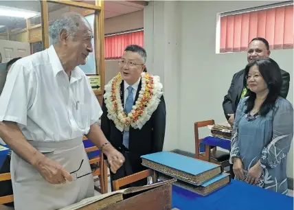  ?? Photo: Lusiana Tuimaisala ?? Speaker of Parliament Ratu Epeli Nailatikau examining historic records at the National Archives of Fiji during the Chinese Ambassador to Fiji Qian Bo’s visit at the facility on August 6, 2020.