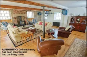  ??  ?? AUTHENTIC: Old machinery has been incorporat­ed into the living room