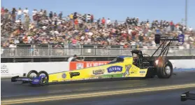  ?? Marc Gewertz / NHRA via AP ?? Brittany Force drives in Top Fuel qualifying Saturday at Sonoma Raceway.