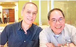  ??  ?? TWO fountain pen restorers: Jun Reinoso with Butch Dalisay.