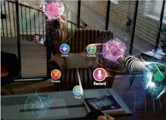  ??  ?? PULSATING BALLS OF SOUND: The AMBEO app, as demonstrat­ed at CES by Sennheiser and Magic Leap.