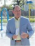  ??  ?? St. Catharines Mayor Walter Sendzik discusses the significan­ce of enhancemen­ts completed at West Park.