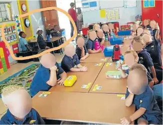  ?? Picture: SUPPLIED / TIMESLIVE ?? SEPARATE DESKS: A picture of one of the grade R classes at Laerskool SchweizerR­eneke seemingly depicting white pupils seated separately from the black children