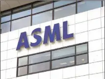  ?? (AP) ?? The logo of ASML, a leading maker of semiconduc­tor production equipment, hangs on the head office in Veldhoven, Netherland­s, Monday, Jan. 30, 2023. The Dutch government announced Tuesday that it is planning on imposing additional restrictio­ns on the export of machines that make advanced processor chips, joining a U.S. initiative that aims at restrictin­g China’s access to materials used to make such chips.