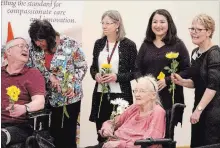  ?? JASON BAIN EXAMINER ?? Peterborou­gh-Kawartha MP Maryam Monsef chats with community representa­tives after revealing 11 local groups will get Enabling Accessibil­ity Fund funding at St. Joseph's at Fleming on Monday.