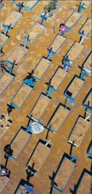  ?? AFP ?? Graves of Covid-19 victims at a cemetery in Manaus, Brazil.